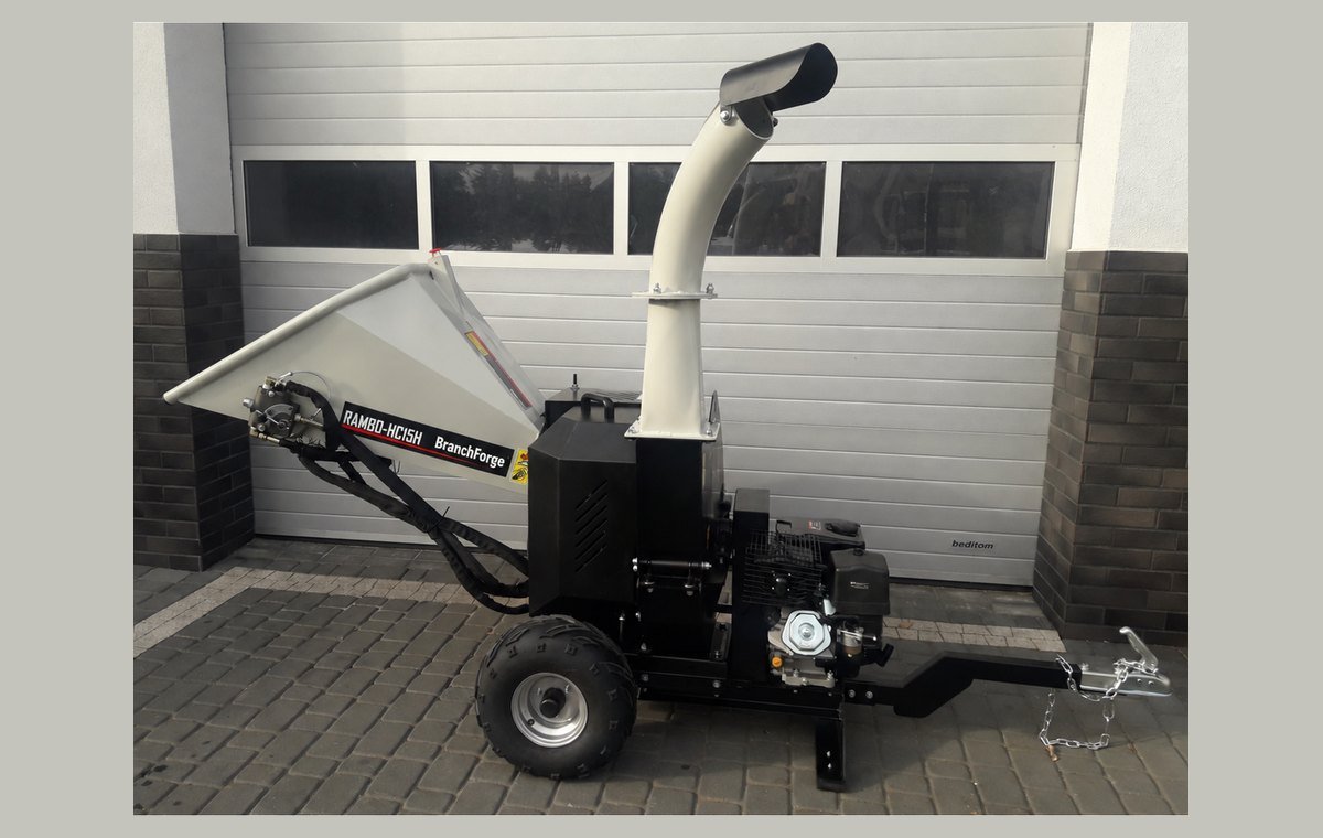HC15H side view showing the road-towable chassis and hitch